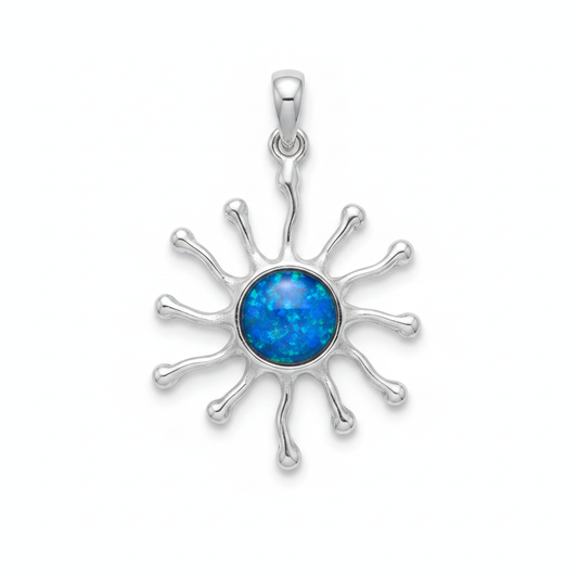 Silver 925 sunburst memorial pendant with blue opal flakes, white background