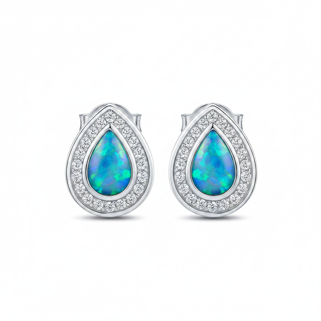 Silver 925 pear CZ halo stud earrings — blue teal opal resin, white background