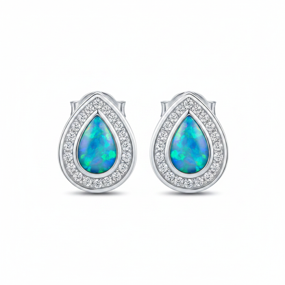 Silver 925 pear CZ halo stud earrings — blue teal opal resin, white background