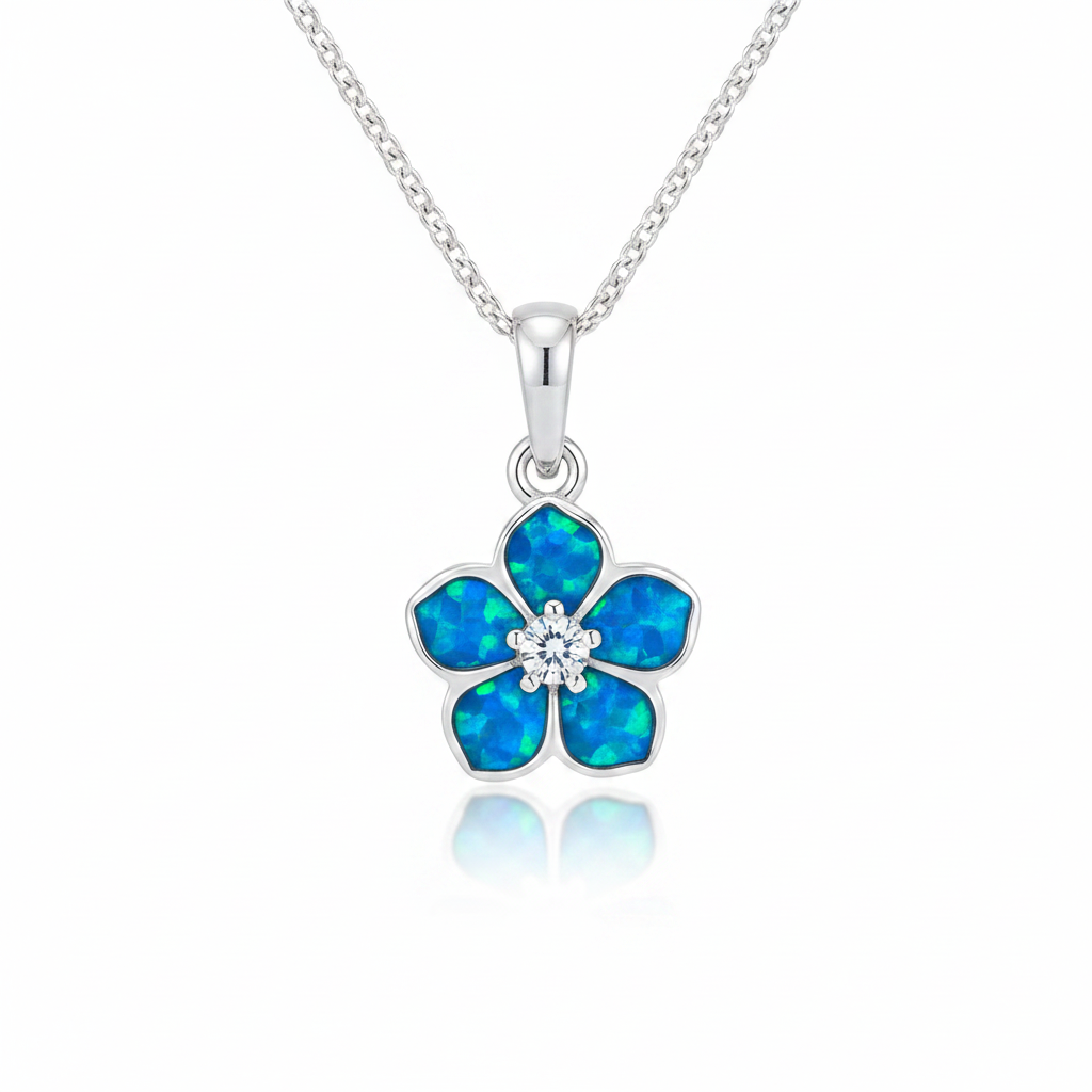 Forget me not silver pendant with blue teal opal resin glowing in petals and CZ centre, white background