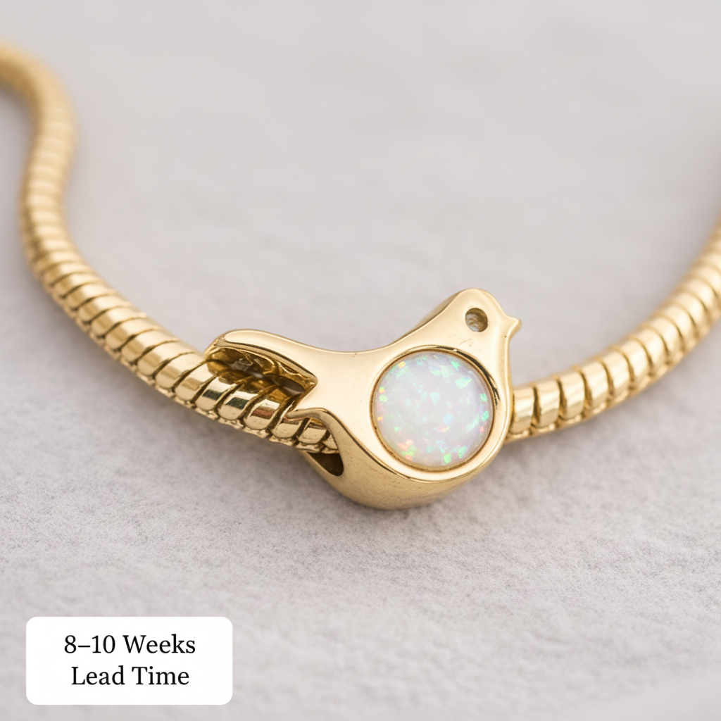 9ct Gold Robin Bead Charm — white pearl opal resin, white background