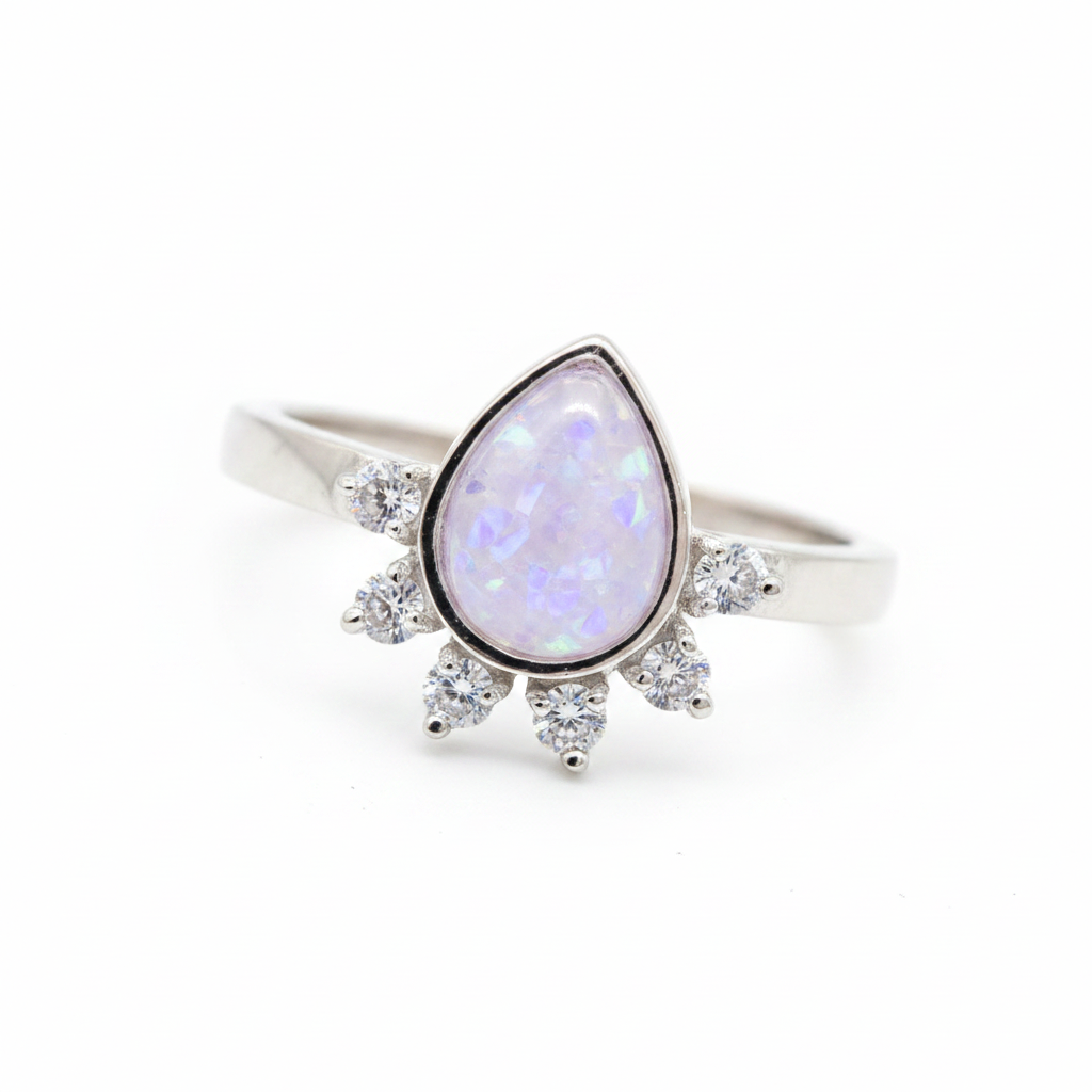 Rain drop CZ 925 silver ring with lavender purple opal resin pear centre on white background