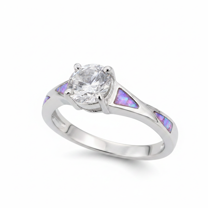Twisted channel solitaire 925 silver ring with lavender purple opal resin in triangular shoulder channels on white background