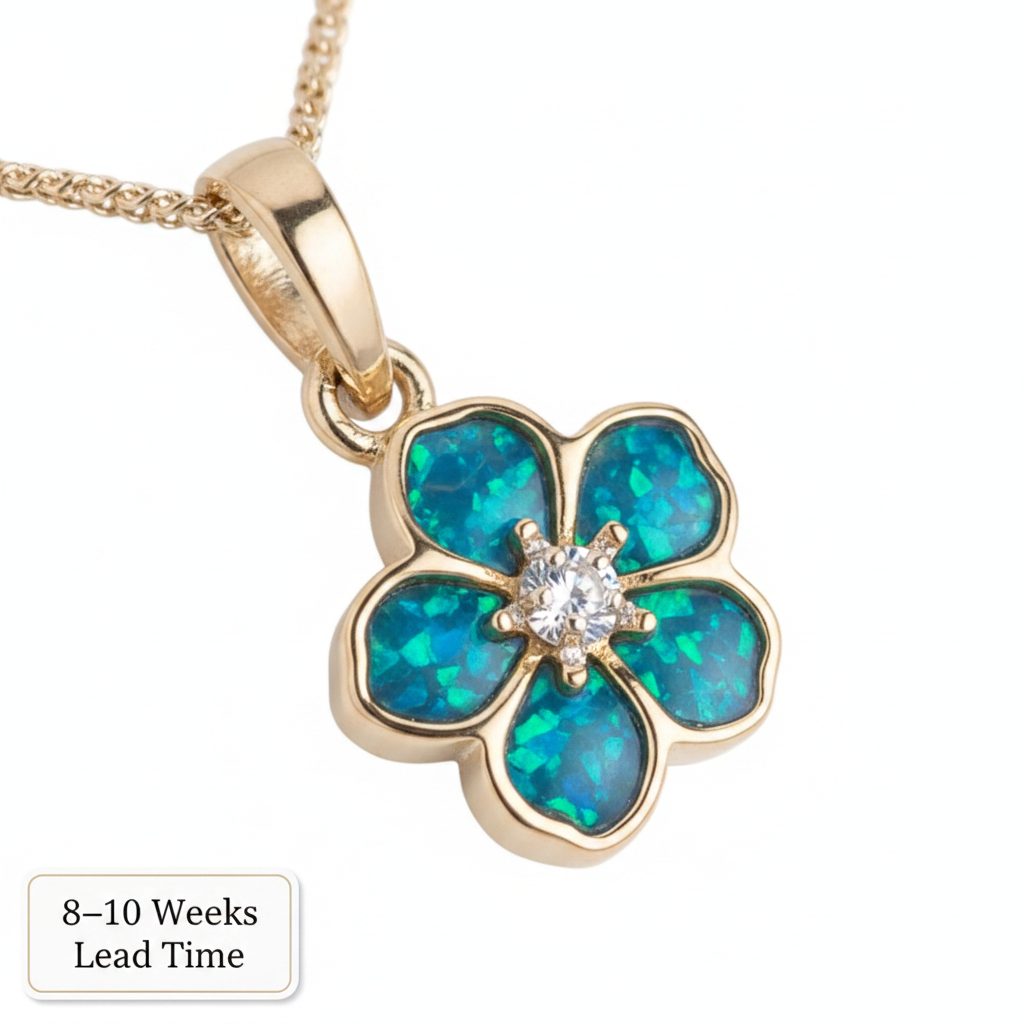 9ct Gold Forget Me Not CZ Pendant — blue teal opal resin petals, white background