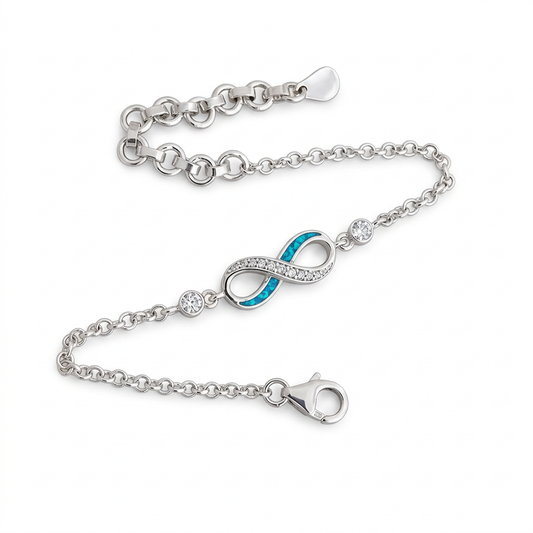 Illustrative mini infinity silver memorial bracelet with blue teal opal resin in two narrow settings