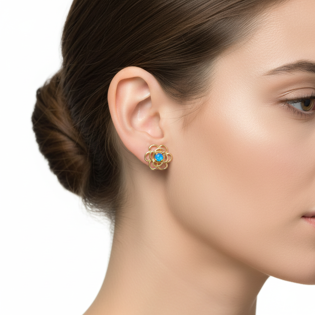 Model wearing gold open rose flower stud earrings with blue opal memorial resin