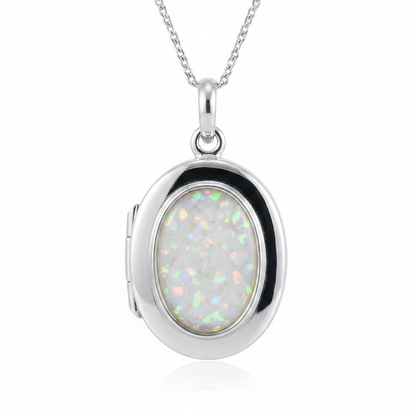 Silver 925 oval locket with white pearl opal resin in 14x10mm setting on white background