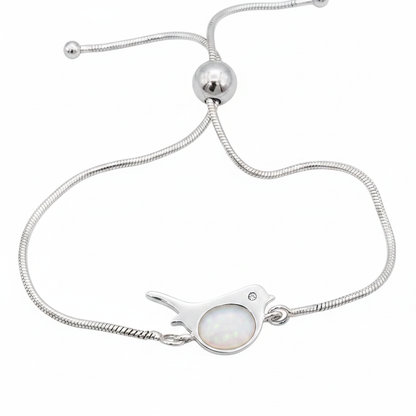 Robin silver snake chain bracelet with white pearl opal resin in robin bezel, white background