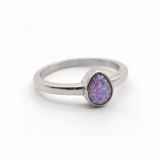 Stainless steel teardrop bezel memorial ring with lavender purple opal flakes resin inclusion on white background
