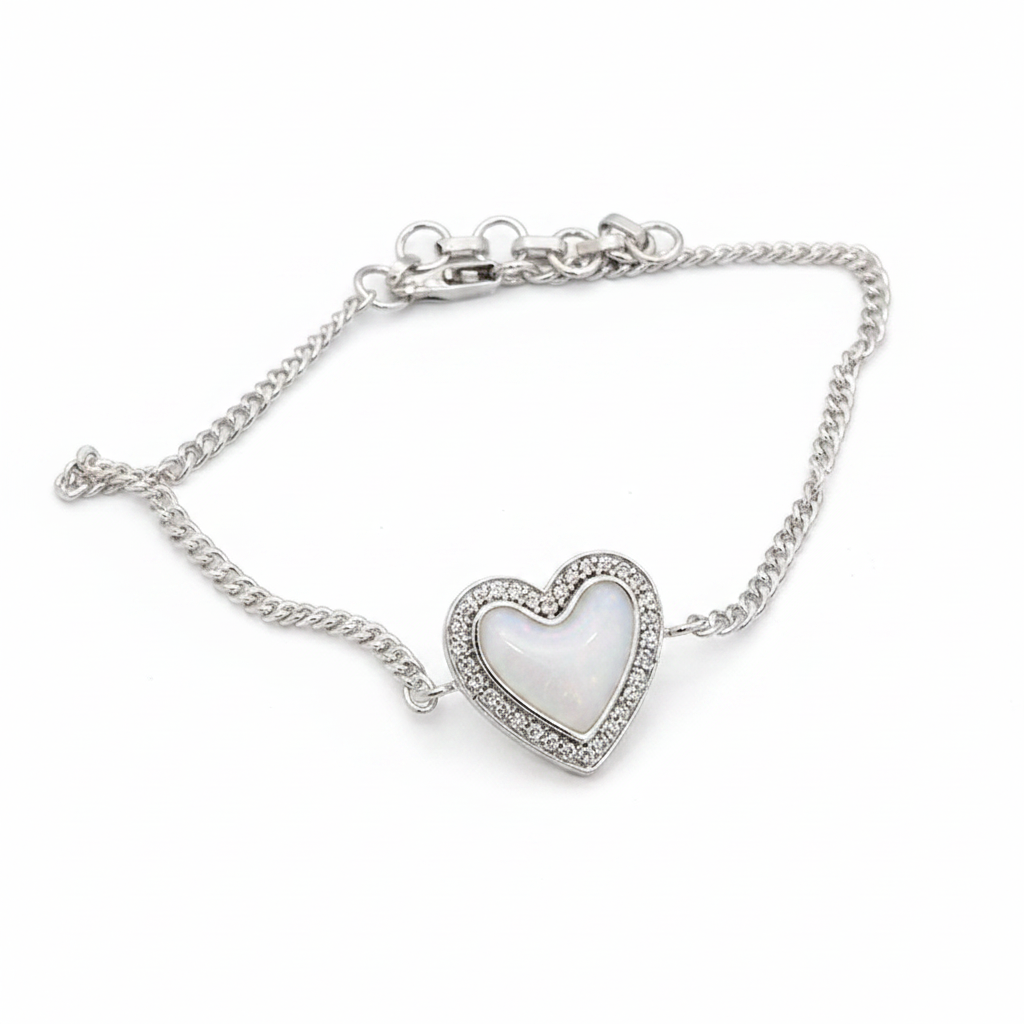 Heart CZ silver curb chain bracelet with white pearl opal resin in CZ halo heart bezel, white background