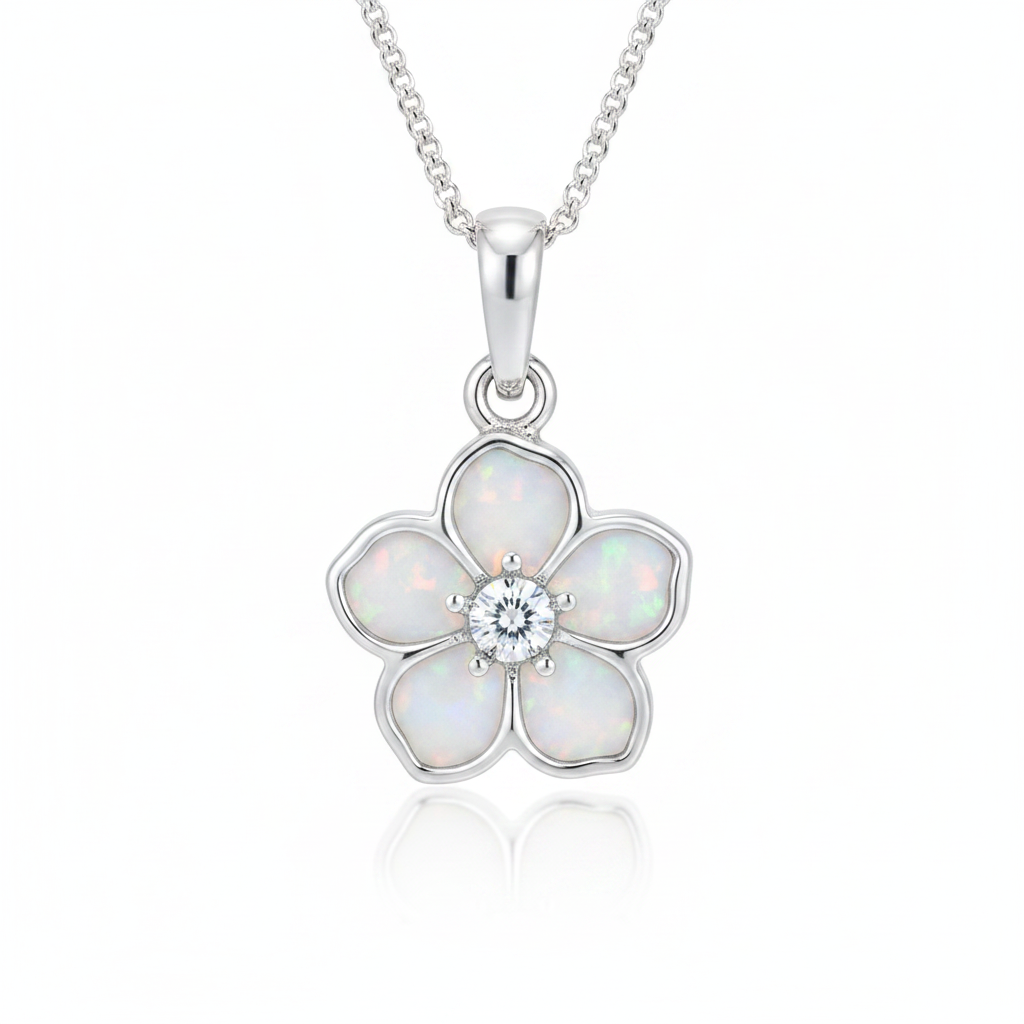 Forget me not silver pendant with white pearl opal resin glowing in petals and CZ centre, white background