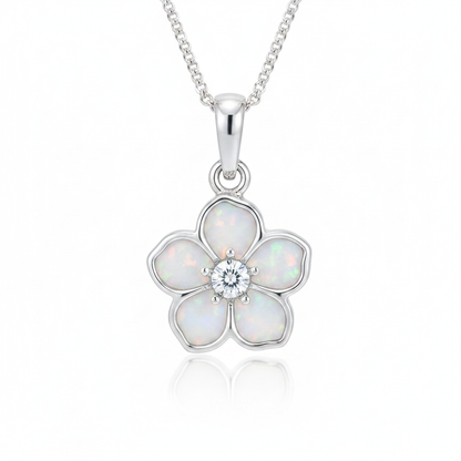 Forget me not silver pendant with white pearl opal resin glowing in petals and CZ centre, white background
