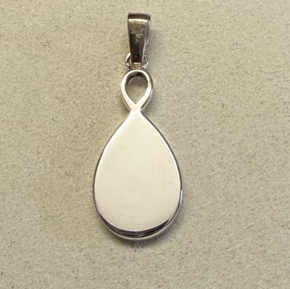 925 sterling silver infinity teardrop pendant flat back showing smooth polished engravable surface