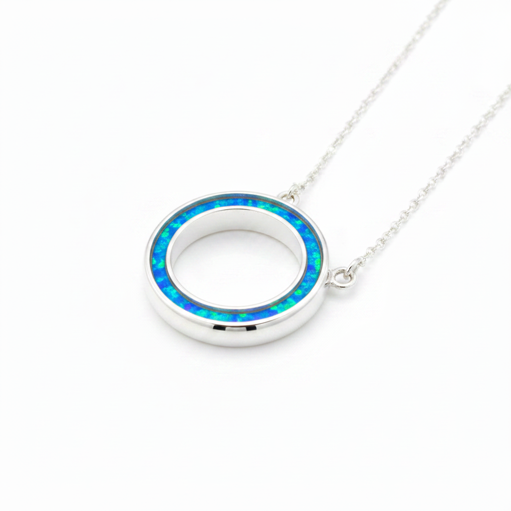 Silver 925 Circle of Life memorial pendant with blue opal resin on chain, white background