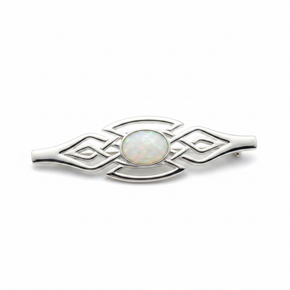 Silver 925 Celtic bar brooch with white pearl opal resin in 8x6mm central setting on white background