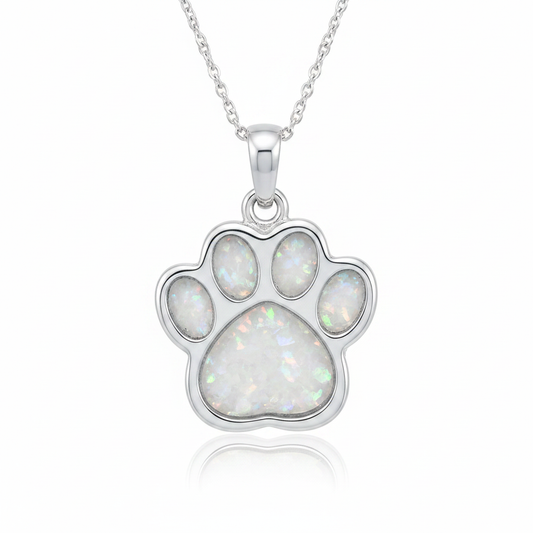Silver 925 dog paw print memorial pendant — white pearl opal flakes resin in all five pad settings