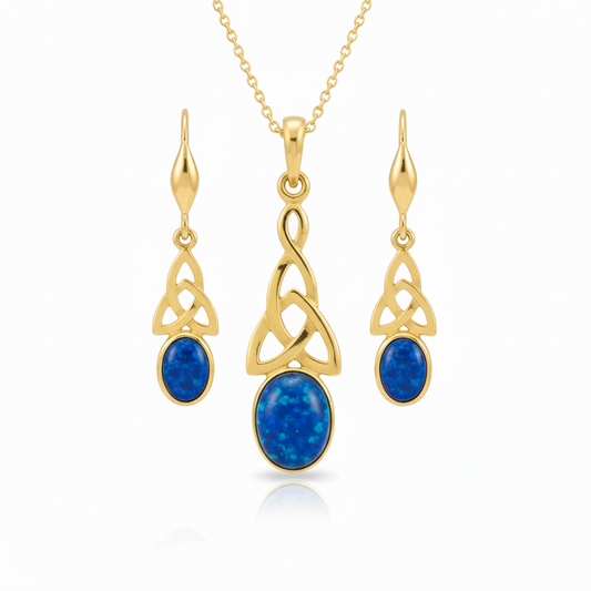9ct gold Celtic memorial jewellery set with deep blue iridescent opal – pendant and earrings flat-lay white background no chain