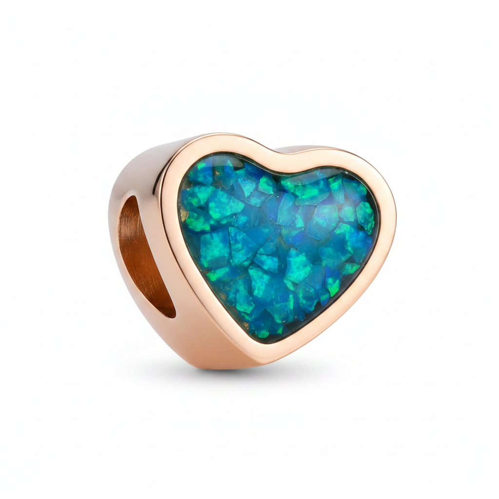 18ct rose gold PVD stainless steel heart charm bead with blue teal opal flakes resin inclusion on white background