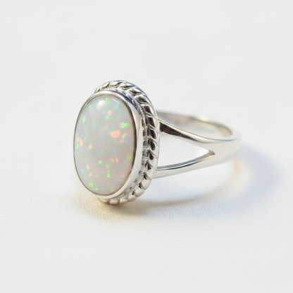 Silver 925 oval rope border memorial ring — white pearl opal flakes resin in 9x6mm oval setting, decorative rope border surround