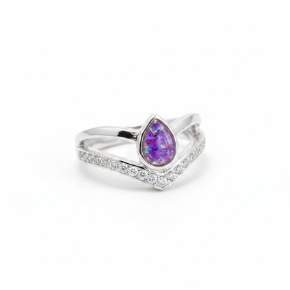 925 sterling silver pear wishbone memorial ring with lavender purple opal flakes in pear bezel on white background