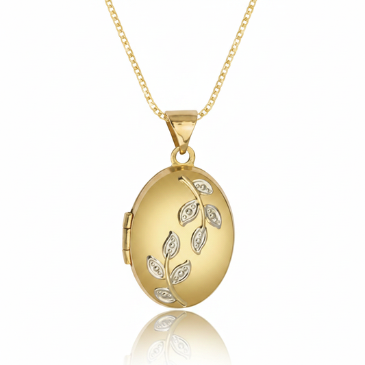 9ct yellow gold oval locket with leaf detail hanging on delicate gold chain — Lovely Oxford