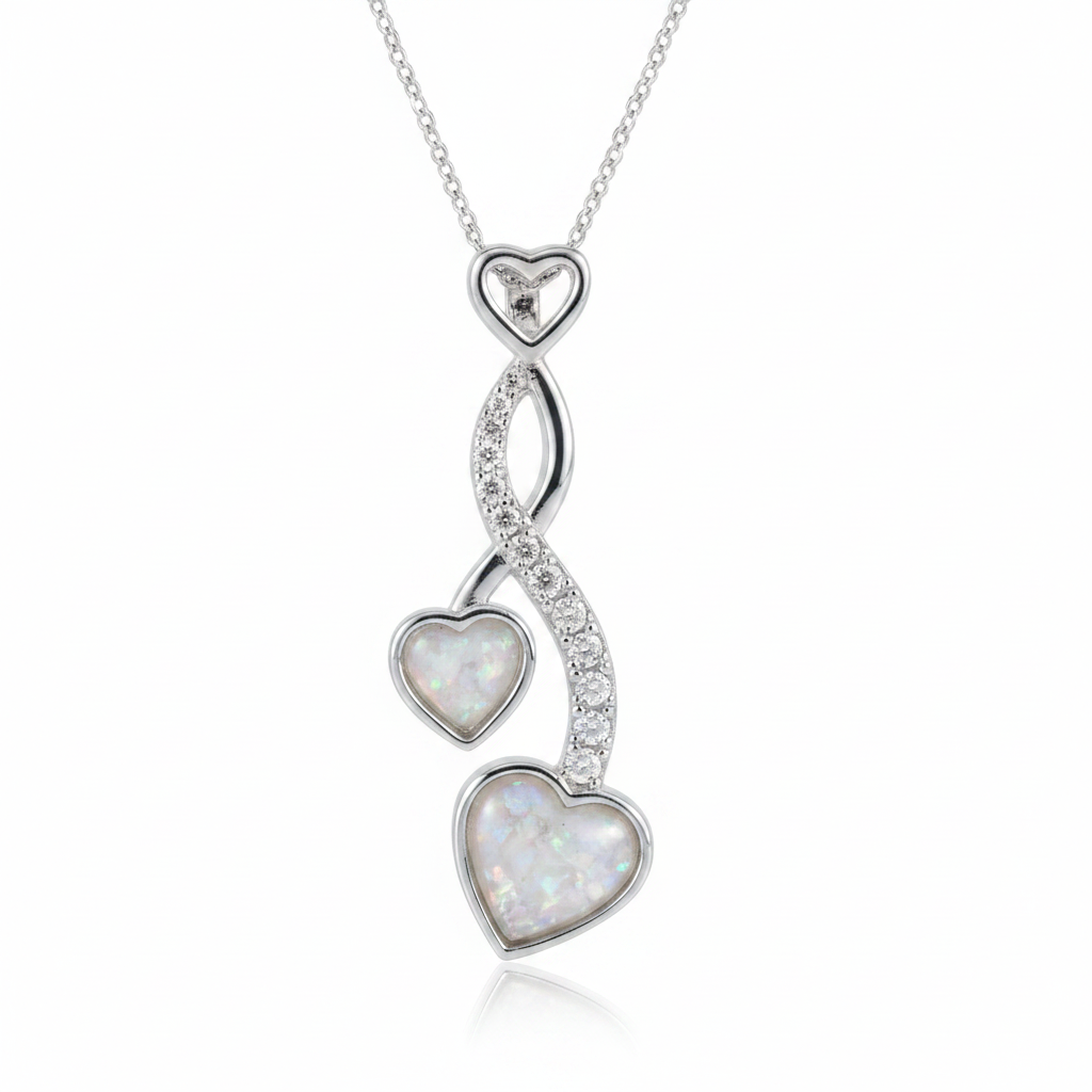 Silver 925 cascading twin heart CZ memorial pendant with white opal and mica resin on chain, white background