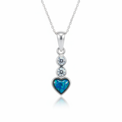 Silver 925 small heart and CZ pendant — blue teal opal flakes domed resin inclusion