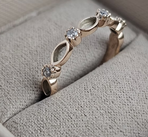 9ct yellow gold half marquise CZ band ring angled view showing band depth and marquise pattern
