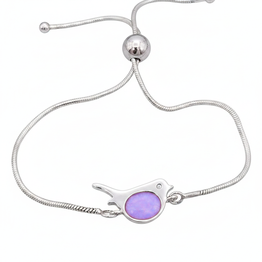 Robin silver snake chain bracelet with lavender purple opal resin in robin bezel, white background