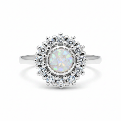 925 sterling silver round CZ cluster halo memorial ring with white pearl opal and mica shimmer in flat round resin setting on white background
