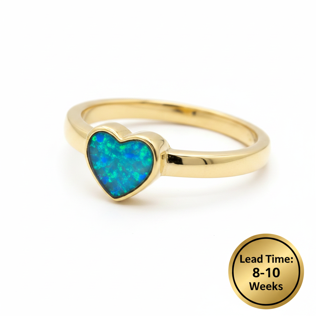 9ct yellow gold plain heart memorial ring with blue teal opal resin in heart bezel, white background, lead time 8-10 weeks