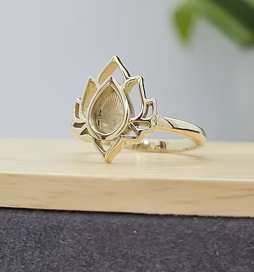 9ct yellow gold lotus flower ring blank, angled side view showing the lotus flower head and delicate band