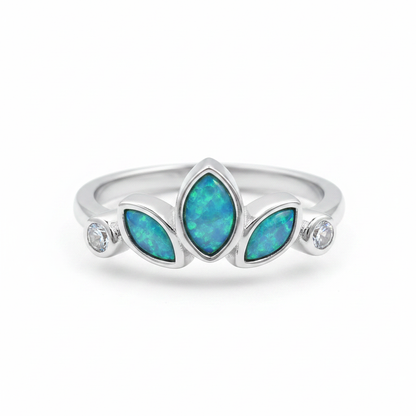 Trilogy marquise bezel 925 silver ring with blue teal opal resin in three marquise settings on white background