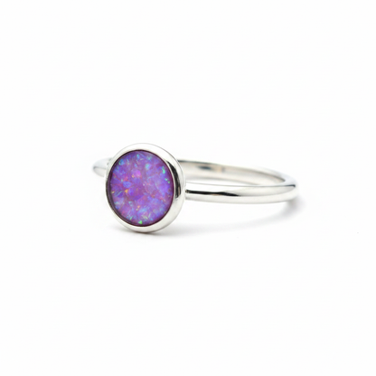 925 sterling silver 5mm round cabochon memorial ring with lavender purple opal flakes in flat round resin setting on white background
