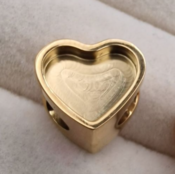 18ct gold PVD stainless steel heart charm bead blank showing large heart form with round resin well on top and horizontal threading hole through centre