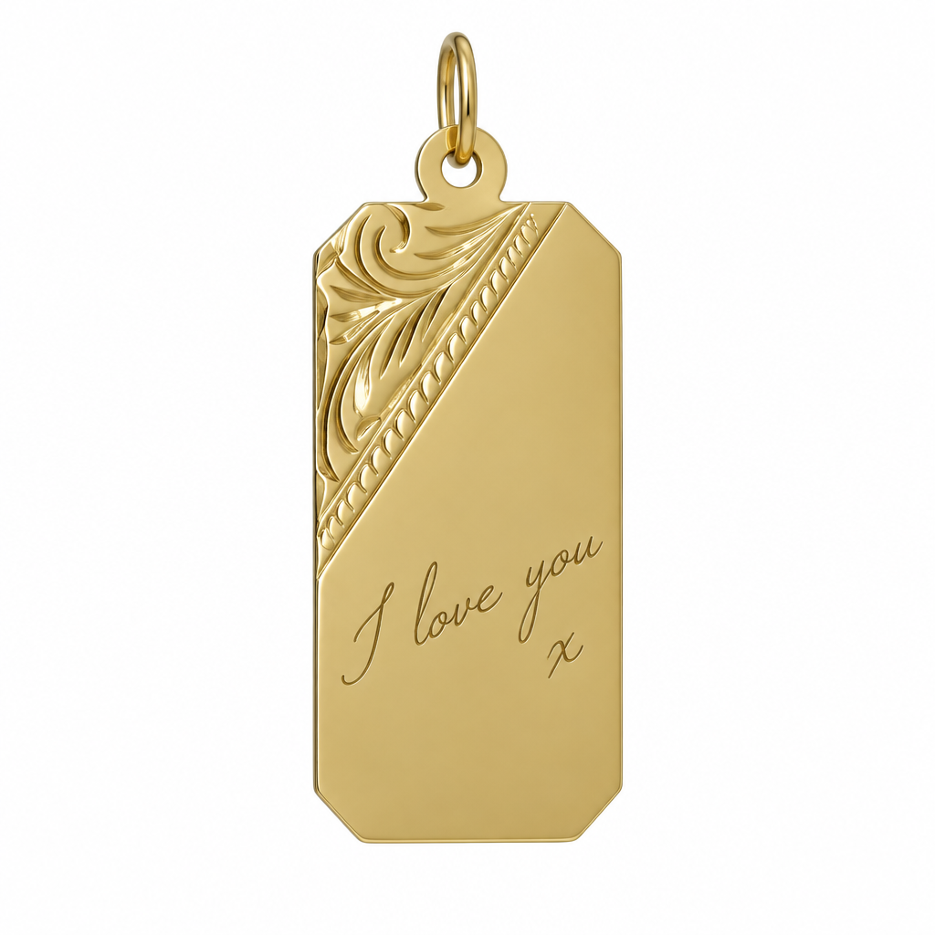 Illustrative handwriting engraving on 9ct yellow gold floral-corner rectangular pendant alone on white