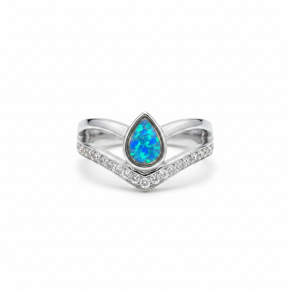 925 sterling silver pear wishbone memorial ring with blue teal opal flakes in pear bezel on white background