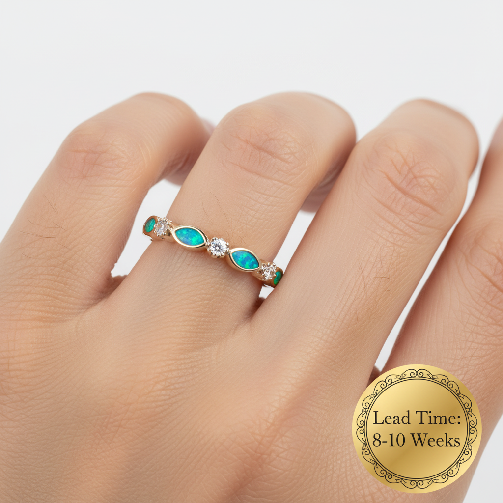 9ct gold half marquise CZ band ring lifestyle worn on finger, white background, lead time 8-10 weeks sticker