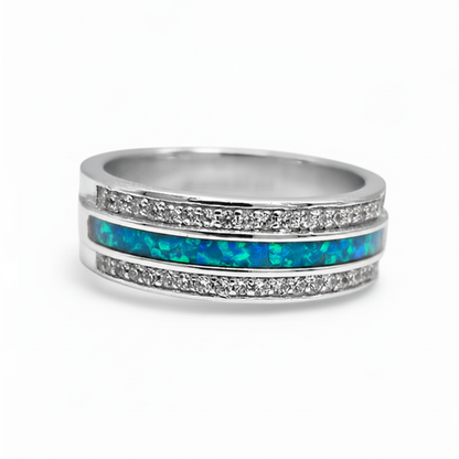 Silver 925 duo crystal ring band with blue teal opal resin in channel groove on white background