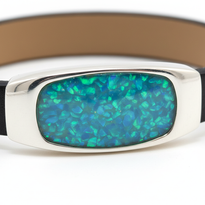 Silver 925 gents leather memorial bracelet — close-up macro of 27x15mm rectangular setting with blue teal opal resin