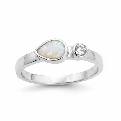 Teardrop single gem 925 silver ring with white pearl opal resin in pear setting on white background