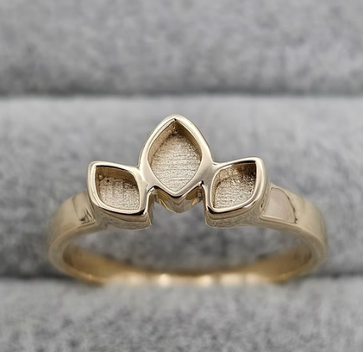 9ct yellow gold triple leaf marquise ring front view showing three marquise bezels on grey velvet