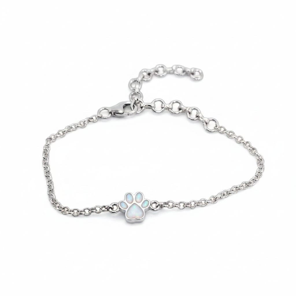 Mini paw charm silver bracelet with white pearl opal resin in paw charm, white background