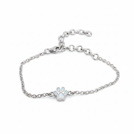 Mini paw charm silver bracelet with white pearl opal resin in paw charm, white background