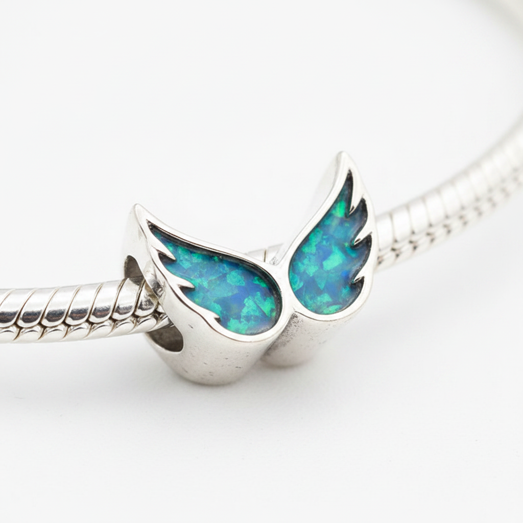 Angel Wings Bead 925 Silver Memorial Charm – blue teal opal inclusion, white background