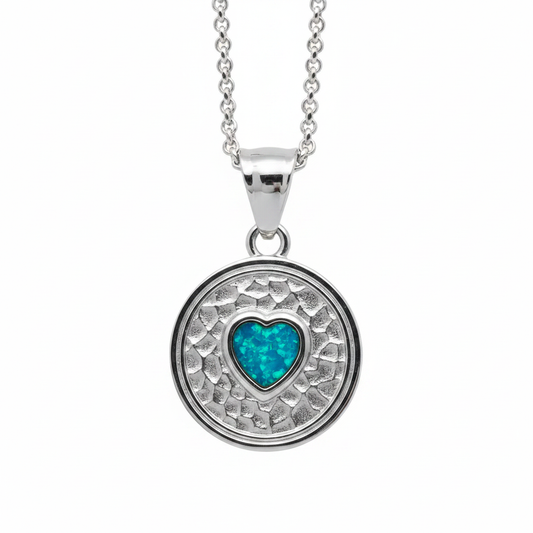 316L stainless steel eternal embrace memorial pendant necklace with blue teal opal resin in heart bezel on white background