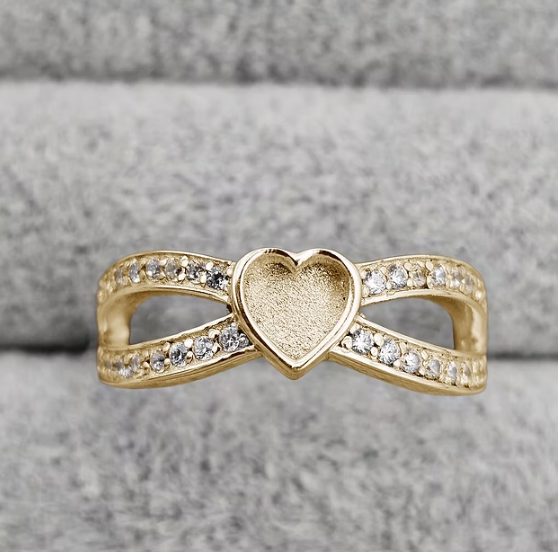 9ct yellow gold heart split shank CZ ring top-down view showing crossover CZ arms and heart bezel centre