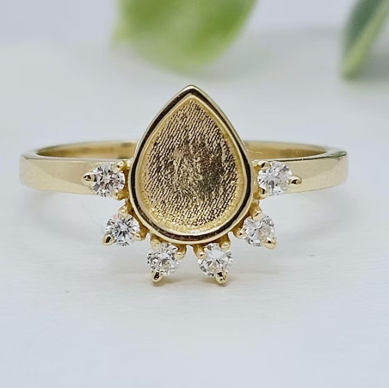 9ct yellow gold CZ raindrop ring front view showing CZ crown halo