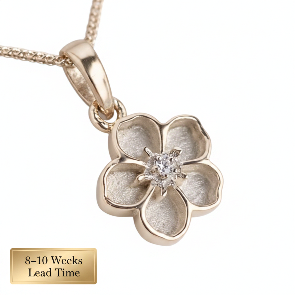 9ct Gold Forget Me Not CZ Pendant — blank petals, white background, 8-10 weeks lead time sticker