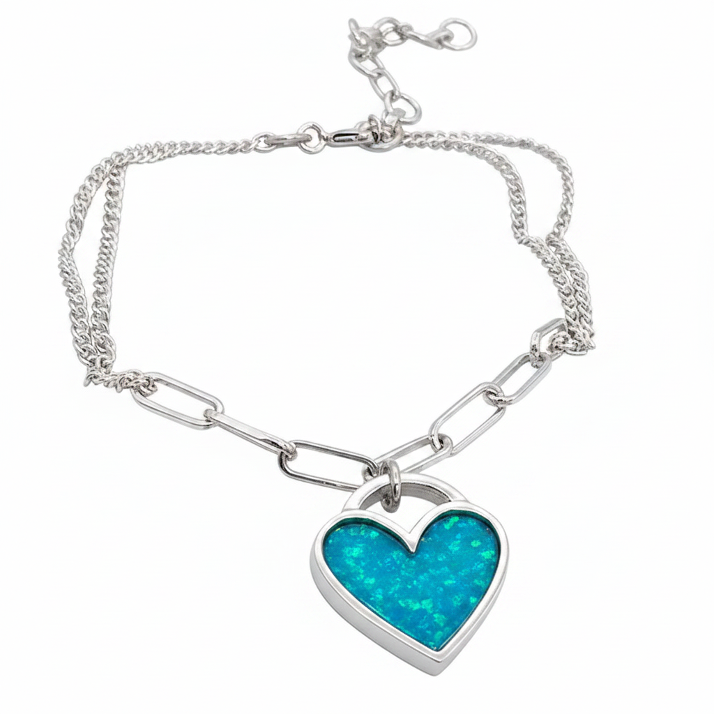 Chunky heart paper clip silver bracelet with blue teal opal resin in heart bezel, white background